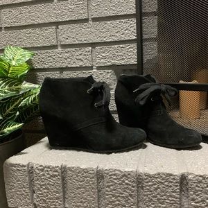 Women’s Dolce Vida black wedge bootie with ties